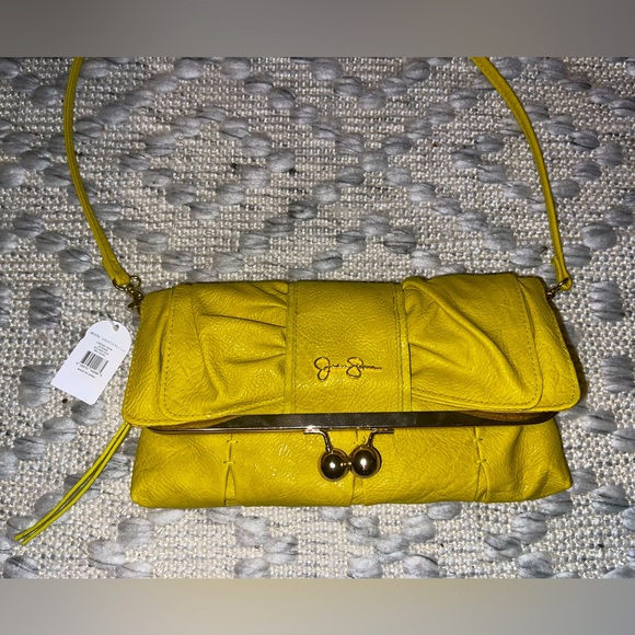 BNWT Jessica Simpson Chrissy Bow fold over handbag/clutch in Golden Rod - Picture 1 of 11